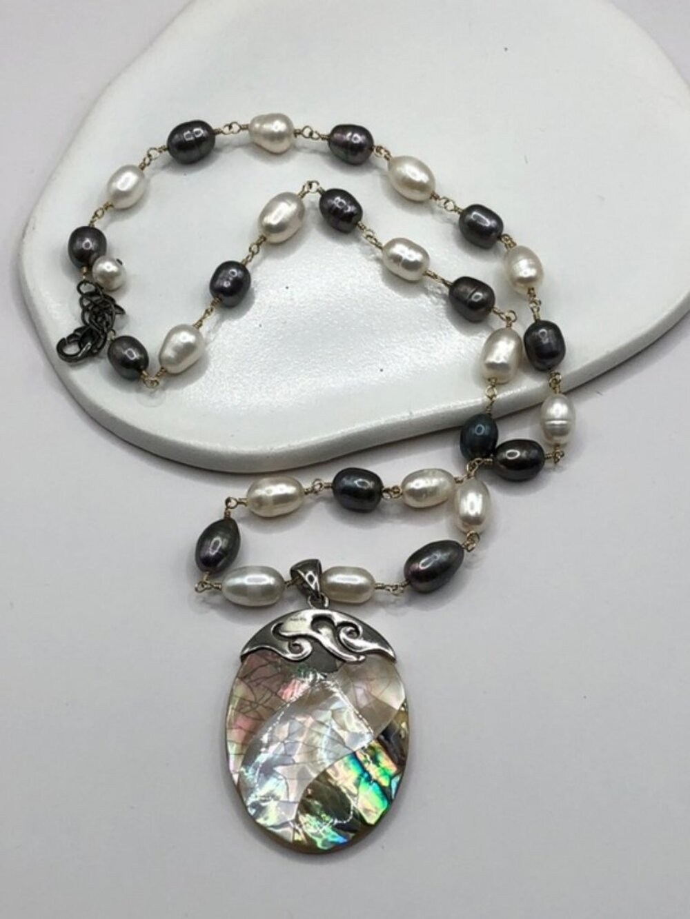 Genuine cultured ring pearls necklace sterling silver mother of pearl pendant.